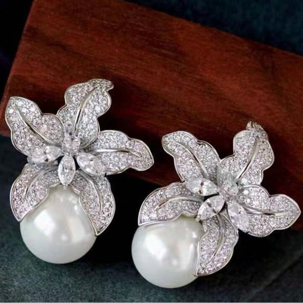 Faux pearl and diamond earrings